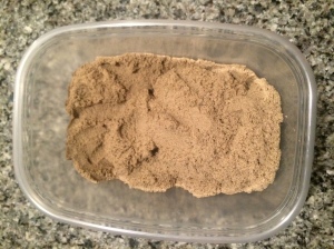 My Kinetic Sand in a storage container.